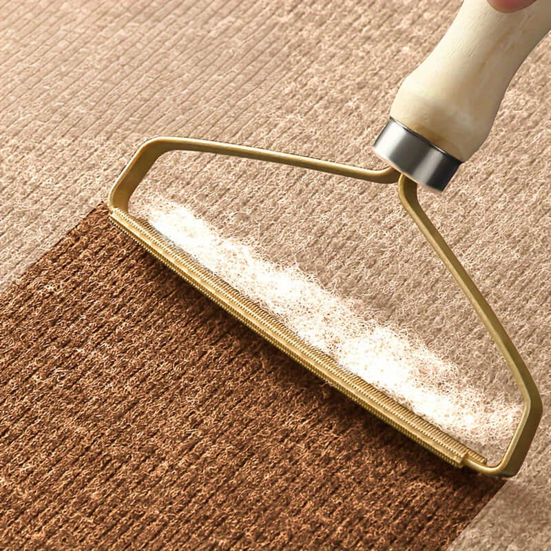 NNETM dog hair remover grooming tool in action, efficiently removing pet fur and lint from upholstery.